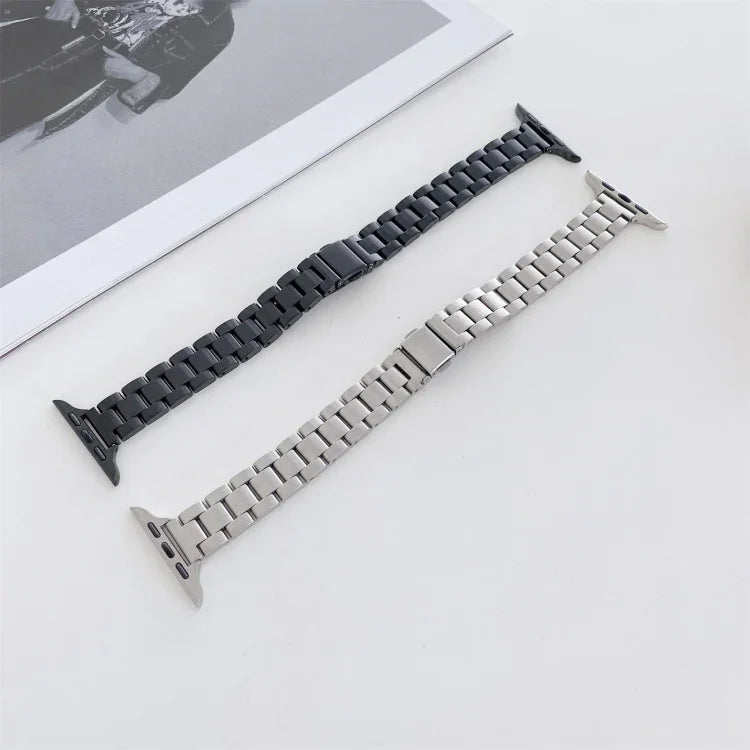 Two steel replacement watchbands for Apple Watch in black and silver, suitable for various models.