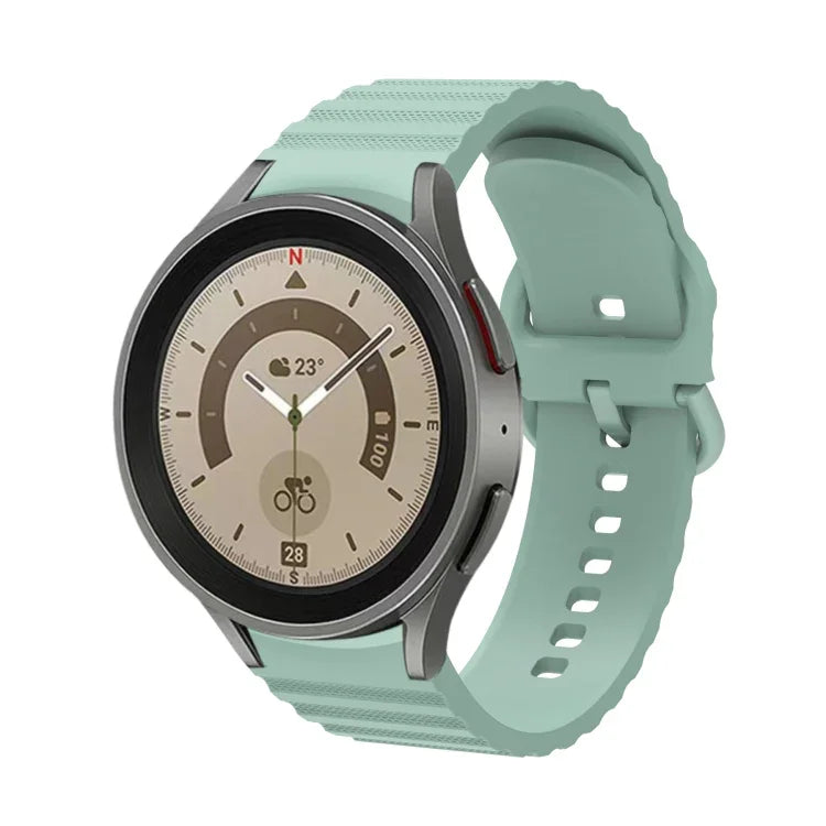 สายรัดนาฬิกาซิลิโคนหัวเข็มขัดลายจุดคลื่นสีเรียบ สำหรับ Samsung Galaxy Watch 6 / 6 Classic