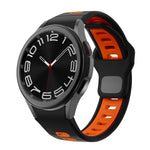สายซิลิโคนลายเส้นสองสีพร้อมหัวเข็มขัดกลับด้าน สำหรับ Samsung Galaxy Watch 7 / 6