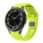 สายซิลิโคนลายเส้นสองสีพร้อมหัวเข็มขัดกลับด้าน สำหรับ Samsung Galaxy Watch 7 / 6