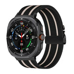 สายรัดนาฬิกานีลอนถักยืดลายริ้วพร้อมหัวเข็มขัดร่ม สำหรับ Samsung Galaxy Watch Ultra 47มม. / Ultra 2025