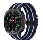 สายรัดนาฬิกานีลอนถักยืดลายริ้วพร้อมหัวเข็มขัดร่ม สำหรับ Samsung Galaxy Watch Ultra 47มม. / Ultra 2025