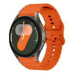 สายรัดนาฬิกาซิลิโคนลายคลื่นเย็บพร้อมหัวเข็มขัดสีสันสดใส xDfind สำหรับ Samsung Galaxy Watch FE / 7 / 6 / 5 / 4