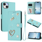 เคสโทรศัพท์หนังวีแกนลายหัวใจดอกไม้สองชั้น ZS01 พร้อมสายรัดข้อมือ สำหรับ iPhone 16 Pro, สำหรับ iPhone 16 Plus, สำหรับ iPhone 16, สำหรับ iPhone 15 Pro Max, สำหรับ iPhone 15 Pro, สำหรับ iPhone 15 Plus
