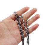 Hand holding 35cm dog training chain showcasing its flexibility and design for effective dog training.