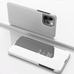 เคสโทรศัพท์หนังแบบพลิกพร้อมกระจกเคลือบเงาแนวนอนและที่ยึด สำหรับ iPhone 16 Pro, สำหรับ iPhone 16 Plus, สำหรับ iPhone 16, สำหรับ iPhone 15 Pro Max, สำหรับ iPhone 15 Pro, สำหรับ iPhone 15 Plus