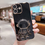 เคสโทรศัพท์ที่ยึดนักบินอวกาศชุบ Electroplating สำหรับ iPhone 17e / 16e, สำหรับ iPhone 17 Pro Max, สำหรับ iPhone 17 Pro, สำหรับ iPhone 17, สำหรับ iPhone Air, สำหรับ iPhone 16 Pro Max, สำหรับ iPhone 16 Pro, สำหรับ iPhone 16 Plus