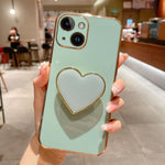 เคสโทรศัพท์ TPU พร้อมที่จับรูปหัวใจชุบอิเล็กโทรพลาติง สำหรับ iPhone 14 Pro Max, สำหรับ iPhone SE 2022 / 2020 / 7 / 8, สำหรับ iPhone 13 Pro Max, สำหรับ iPhone 13 Pro, สำหรับ iPhone 13, สำหรับ iPhone 13 mini, สำหรับ iPhone 12, สำหรับ iPhone 12 Pro Max