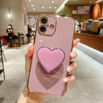 เคสโทรศัพท์ TPU พร้อมที่จับรูปหัวใจชุบอิเล็กโทรพลาติง สำหรับ iPhone 17e / 16e, สำหรับ iPhone 17 Pro Max, สำหรับ iPhone 17 Pro, สำหรับ iPhone 17, สำหรับ iPhone Air, สำหรับ iPhone 16 Pro Max, สำหรับ iPhone 16 Pro, สำหรับ iPhone 16 Plus