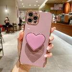 เคสโทรศัพท์ TPU พร้อมที่จับรูปหัวใจชุบอิเล็กโทรพลาติง สำหรับ iPhone 17e / 16e, สำหรับ iPhone 17 Pro Max, สำหรับ iPhone 17 Pro, สำหรับ iPhone 17, สำหรับ iPhone Air, สำหรับ iPhone 16 Pro Max, สำหรับ iPhone 16 Pro, สำหรับ iPhone 16 Plus