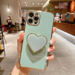 เคสโทรศัพท์ TPU พร้อมที่จับรูปหัวใจชุบอิเล็กโทรพลาติง สำหรับ iPhone 17e / 16e, สำหรับ iPhone 17 Pro Max, สำหรับ iPhone 17 Pro, สำหรับ iPhone 17, สำหรับ iPhone Air, สำหรับ iPhone 16 Pro Max, สำหรับ iPhone 16 Pro, สำหรับ iPhone 16 Plus