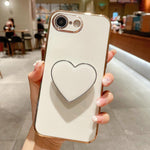 เคสโทรศัพท์ TPU พร้อมที่จับรูปหัวใจชุบอิเล็กโทรพลาติง สำหรับ iPhone 17e / 16e, สำหรับ iPhone 17 Pro Max, สำหรับ iPhone 17 Pro, สำหรับ iPhone 17, สำหรับ iPhone Air, สำหรับ iPhone 16 Pro Max, สำหรับ iPhone 16 Pro, สำหรับ iPhone 16 Plus