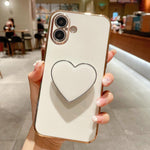 เคสโทรศัพท์ TPU พร้อมที่จับรูปหัวใจชุบอิเล็กโทรพลาติง สำหรับ iPhone 17e / 16e, สำหรับ iPhone 17 Pro Max, สำหรับ iPhone 17 Pro, สำหรับ iPhone 17, สำหรับ iPhone Air, สำหรับ iPhone 16 Pro Max, สำหรับ iPhone 16 Pro, สำหรับ iPhone 16 Plus