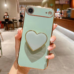 เคสโทรศัพท์ TPU พร้อมที่จับรูปหัวใจชุบอิเล็กโทรพลาติง สำหรับ iPhone 17e / 16e, สำหรับ iPhone 17 Pro Max, สำหรับ iPhone 17 Pro, สำหรับ iPhone 17, สำหรับ iPhone Air, สำหรับ iPhone 16 Pro Max, สำหรับ iPhone 16 Pro, สำหรับ iPhone 16 Plus