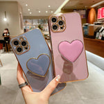 เคสโทรศัพท์ TPU พร้อมที่จับรูปหัวใจชุบอิเล็กโทรพลาติง สำหรับ iPhone 14 Pro Max, สำหรับ iPhone SE 2022 / 2020 / 7 / 8, สำหรับ iPhone 13 Pro Max, สำหรับ iPhone 13 Pro, สำหรับ iPhone 13, สำหรับ iPhone 13 mini, สำหรับ iPhone 12, สำหรับ iPhone 12 Pro Max