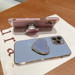 เคสโทรศัพท์ TPU พร้อมที่จับรูปหัวใจชุบอิเล็กโทรพลาติง สำหรับ iPhone 14 Pro Max, สำหรับ iPhone SE 2022 / 2020 / 7 / 8, สำหรับ iPhone 13 Pro Max, สำหรับ iPhone 13 Pro, สำหรับ iPhone 13, สำหรับ iPhone 13 mini, สำหรับ iPhone 12, สำหรับ iPhone 12 Pro Max