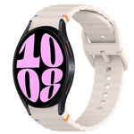 สายรัดนาฬิกาซิลิโคนลายเม็ดคลื่นเย็บพร้อมระบบปลดเร็ว สำหรับ Samsung Galaxy Watch 6 ขนาด 44 มม., สำหรับ Samsung Galaxy Watch 6 ขนาด 40 มม., สำหรับ Samsung Galaxy Watch 6 Classic ขนาด 43 มม., สำหรับ Samsung Galaxy Watch 5 Pro Golf Edition