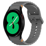 สายรัดนาฬิกาซิลิโคนลายคลื่นเย็บ พร้อมระบบปลดล็อกด่วน สำหรับ Samsung Galaxy Watch 4 44 มม. สำหรับ Samsung Galaxy Watch 4 40 มม. สำหรับ Samsung Galaxy Watch 4 Classic 46 มม. สำหรับ Samsung Galaxy Watch 4 Classic 42 มม.