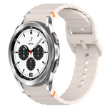 สายรัดนาฬิกาซิลิโคนลายคลื่นเย็บ พร้อมระบบปลดล็อกด่วน สำหรับ Samsung Galaxy Watch 4 44 มม. สำหรับ Samsung Galaxy Watch 4 40 มม. สำหรับ Samsung Galaxy Watch 4 Classic 46 มม. สำหรับ Samsung Galaxy Watch 4 Classic 42 มม.