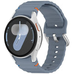 สายรัดนาฬิกาซิลิโคนลายคลื่นเย็บหัวเข็มขัดเงิน สำหรับ Samsung Galaxy Watch 7 40 / 44mm