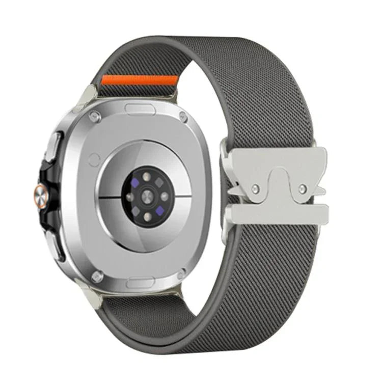 สายรัดนาฬิกาไนลอนยืดหยุ่นแบบหัวเข็มขัดร่มชูชีพ สำหรับ Samsung Galaxy Watch8 / Watch8 Classic