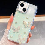 เคสโทรศัพท์กันกระแทกประดับมุกและกลิตเตอร์เพชรรูปผีเสื้อสี่มุม สำหรับ iPhone 13