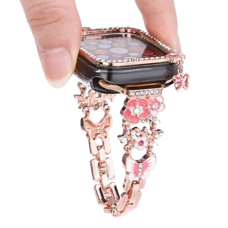 ชุดสายรัดนาฬิกาเปลือกกลวงเพชรเดี่ยวดอกไม้พู่ สำหรับ Apple Watch Series 6 / 5 / 4 & SE 44 มม., สำหรับ Apple Watch Series 6 / 5 / 4 & SE 40 มม., สำหรับ Apple Watch Series 10 / 11 46 มม., สำหรับ Apple Watch Series 10 / 11 42 มม.