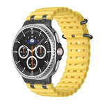 สายซิลิโคนหัวเข็มขัดวงแหวนสีดำรูระบายอากาศแบบมหาสมุทร สำหรับ Samsung Galaxy Watch8 / Watch8 Classic