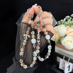 สายคล้องโทรศัพท์ลูกบาศก์โฮโลกราฟิกคริสตัลสีดำรูปโบว์ประกายแวววาว สีชมพู ทอง