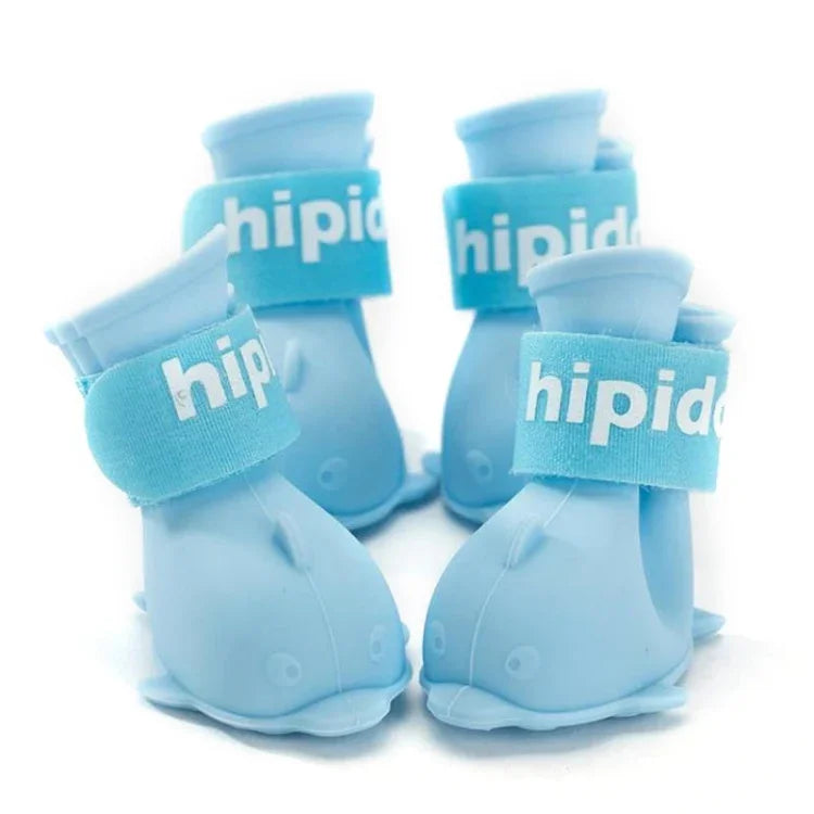 4 PCS/Set waterproof cartoon dog shoes in blue silicone with strap for pets.