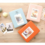 ซองใส่นามบัตร 64 ช่อง สำหรับ Fujifilm Instax Mini 8 /7s /70 /25 /50s /90, 64 ช่อง สีเบจ, 64 ช่อง สีน้ำเงิน, 64 ช่อง สีเขียว, 64 ช่อง สีส้ม, 64 ช่อง สีชมพู, 64 ช่อง สีฟ้า