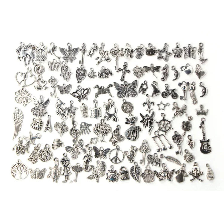 สร้อยข้อมือและจี้แฟชั่นสีเงินโบราณผสม 100 ชิ้น DIY เครื่องประดับยุโรปทำมือ