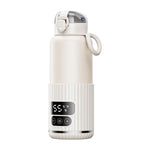 เครื่องอุ่นขวดนมเด็กแบบพกพา แบตเตอรี่ 15000mAh ถ้วยอุ่นอัจฉริยะไร้สาย ปรับอุณหภูมิได้และอุ่นคงที่ 48 ชั่วโมง กันน้ำ IPX6 สีขาวแก้ว สีเขียวแก้ว สีขาวสแตนเลส สีเขียวสแตนเลส
